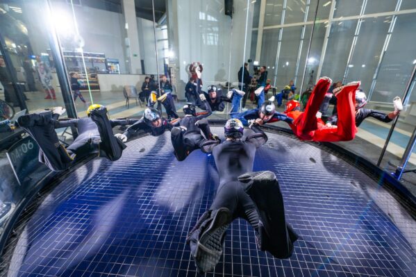 Kuzbass Arena Wind Tunnel With A Group Of Athletes In A Formation Flight