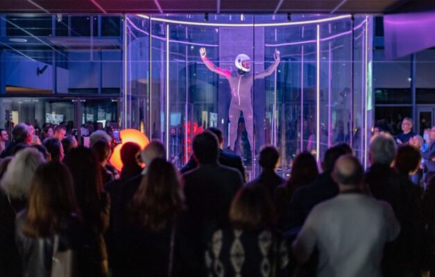 Person Flying In The Wind Tunnel At Windalps Indoor Skydiving