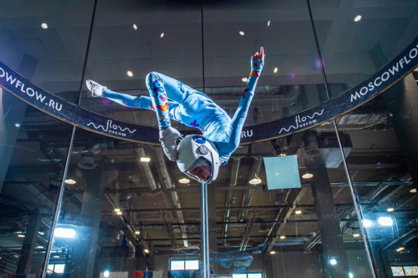 Dramatic Photo Of Person Flying At Flow Moscow Indoor Skydiving