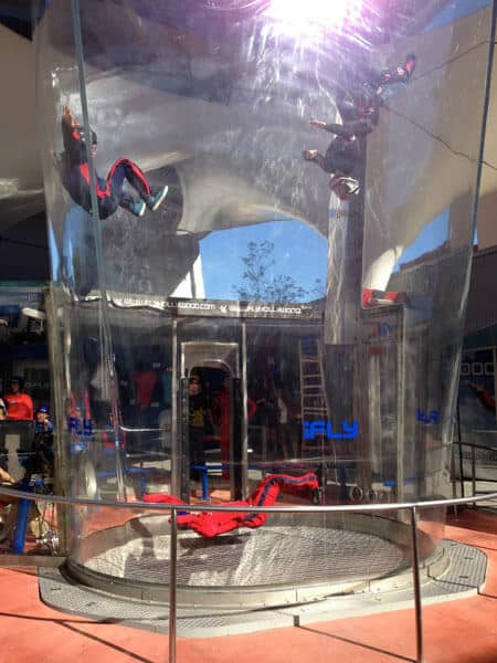 Some Skydivers Flying In The Tunnel Along The Universal Studios Citywalk.