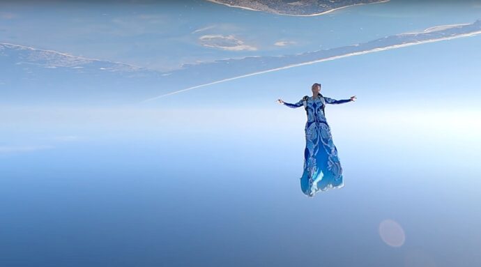 Domitille Kiger Skydiving In A Dress Designed By Iris Van Herpen
