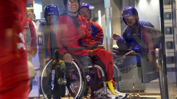 wheelchair user in indoor skydiving tunnel iFLY